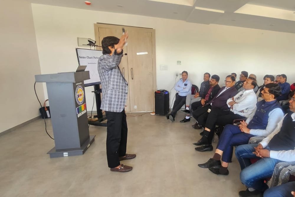 CA Prateek Dangi teaching a full room during a live learning session
